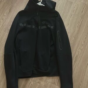 Black Nike tech jacket